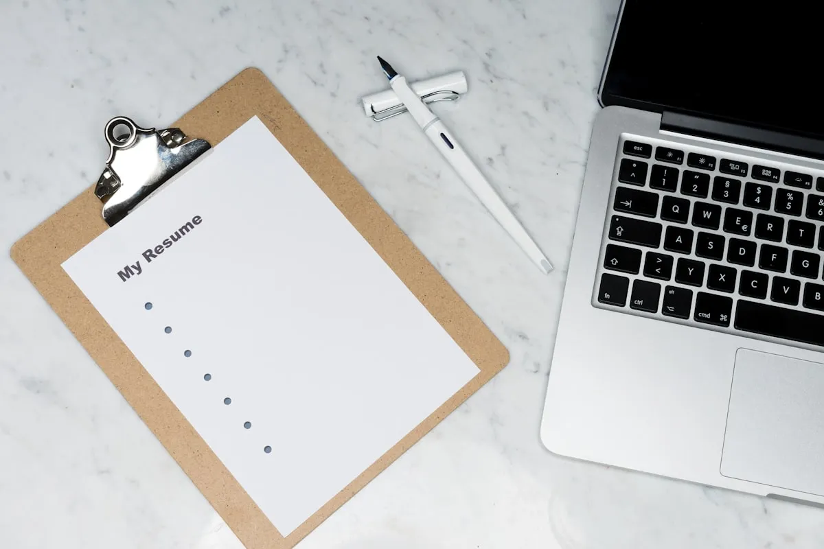 Printed photo sheets and documents on a desk